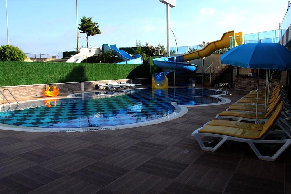 Merlin Beach Park Hotel Tosmur Bagian luar foto
