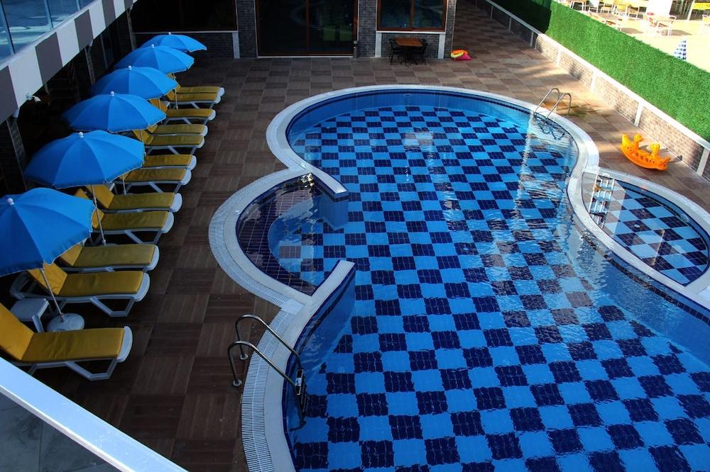 Merlin Beach Park Hotel Tosmur Bagian luar foto
